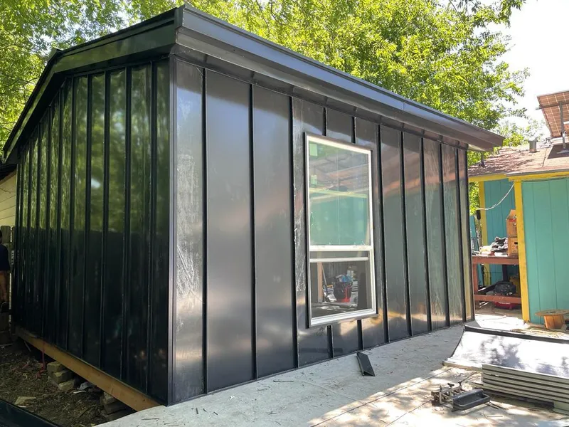 Black standing seam metal wall panels for Metal Roof Installation in White