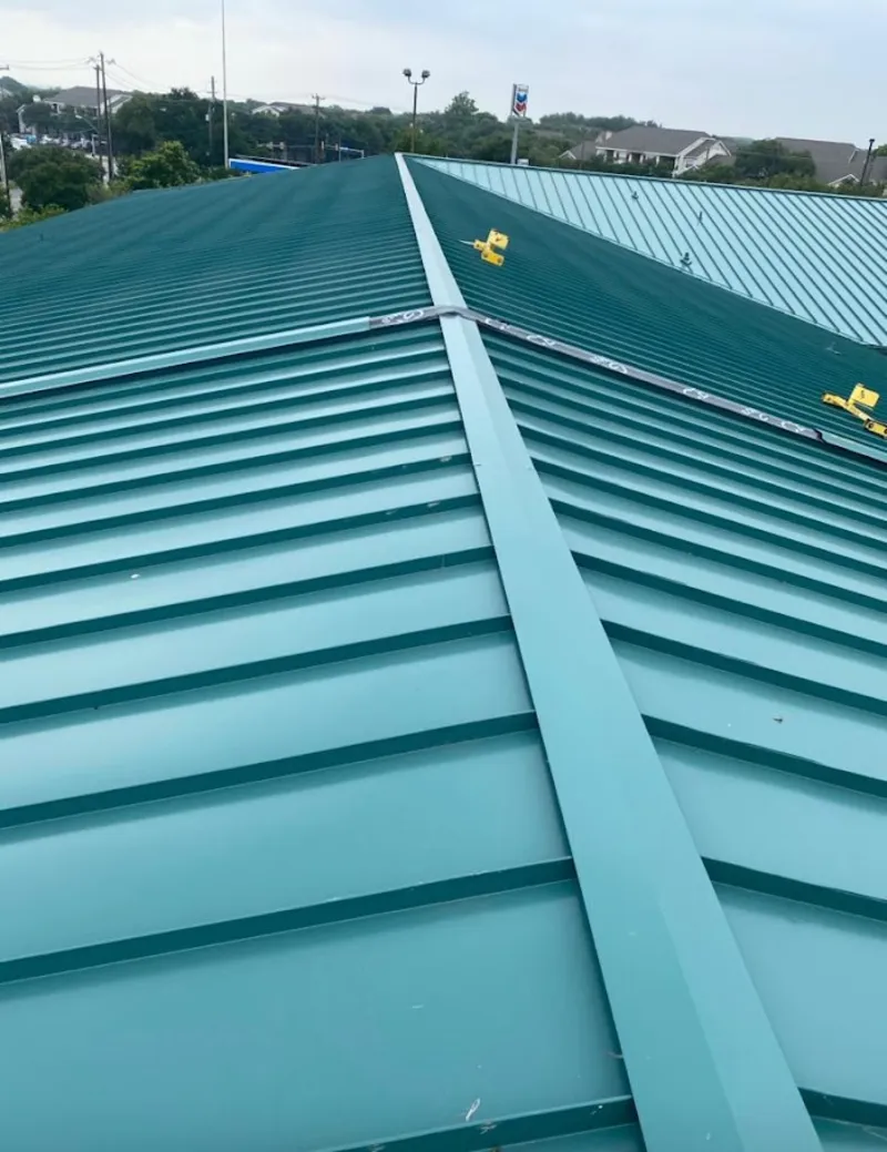 Green commercial metal roof ridge and valley for Metal Roof Repair in White